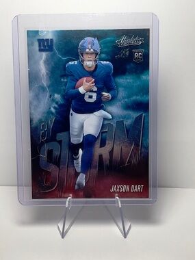 2025 Panini Absolute "By Storm" rookie football card featuring Jaxson Dart